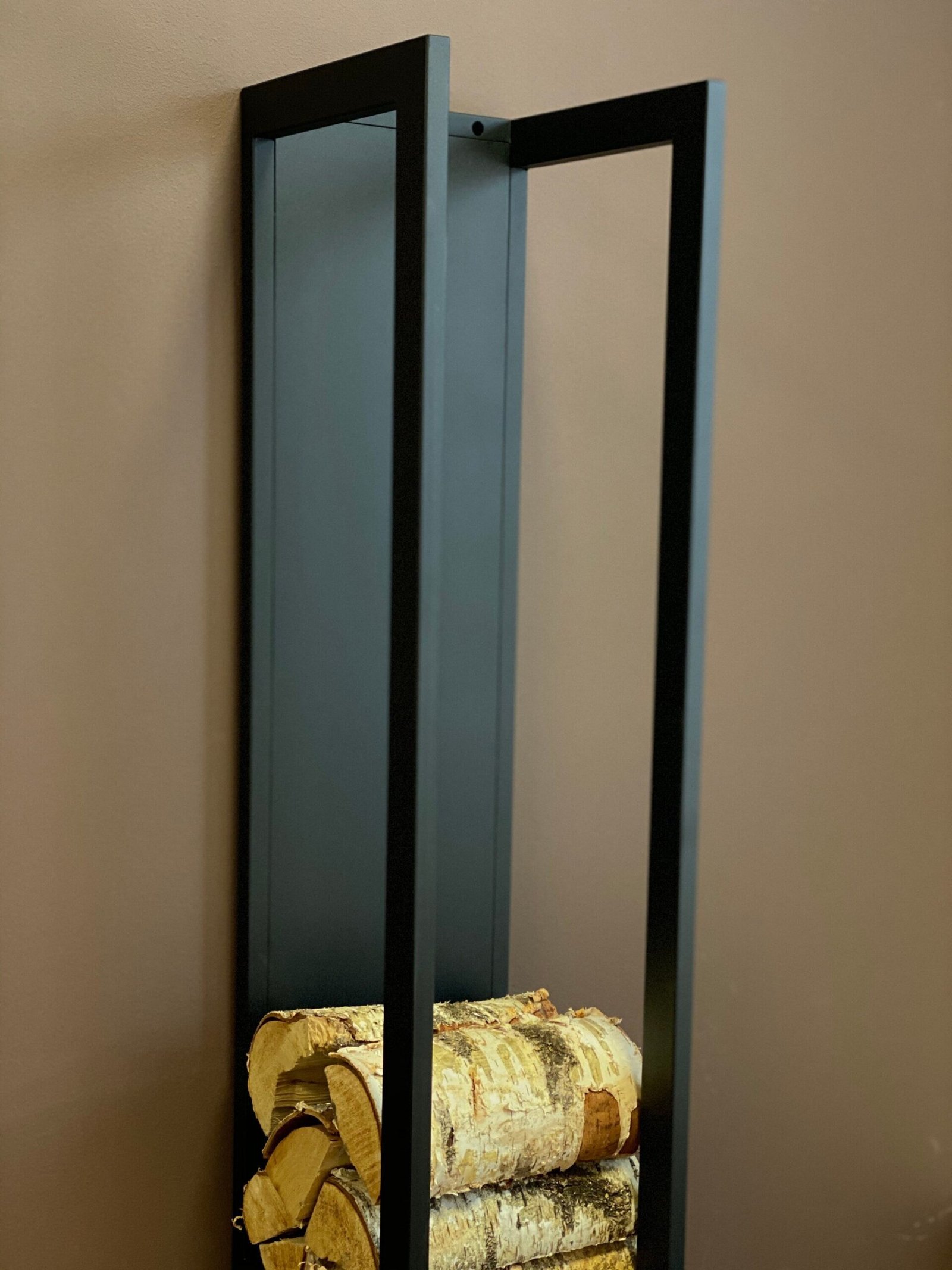 Plate wall mounted firewood rack, view 2