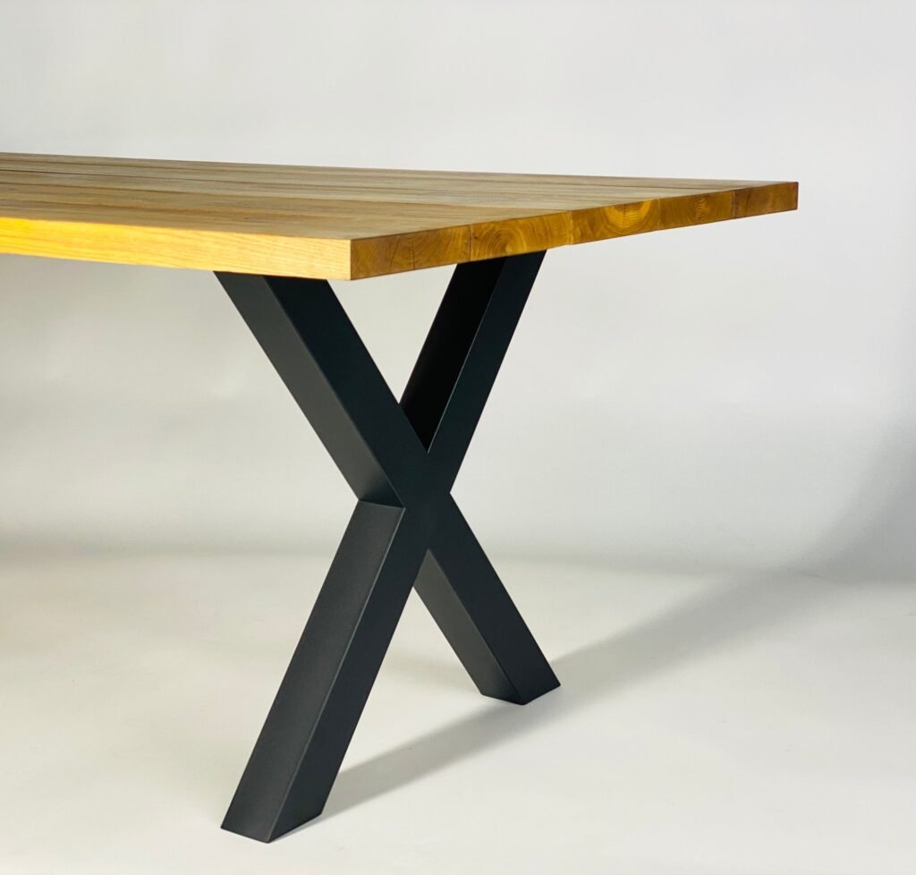 Xstyle desk legs in black under a solid wood top